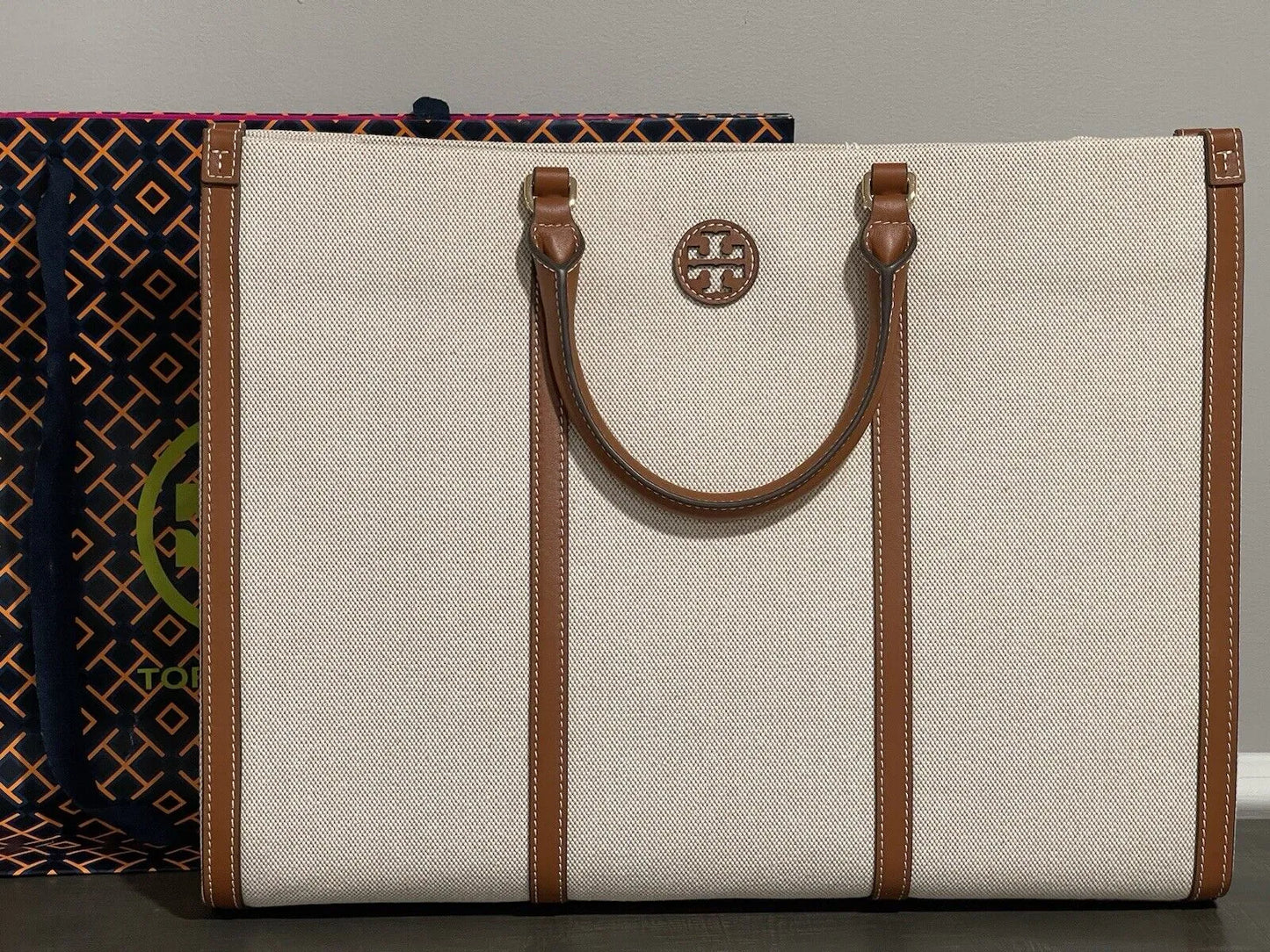 Tory Burch Perry T Monogram Triple-Compartment Tote Bag in various colors. PO24