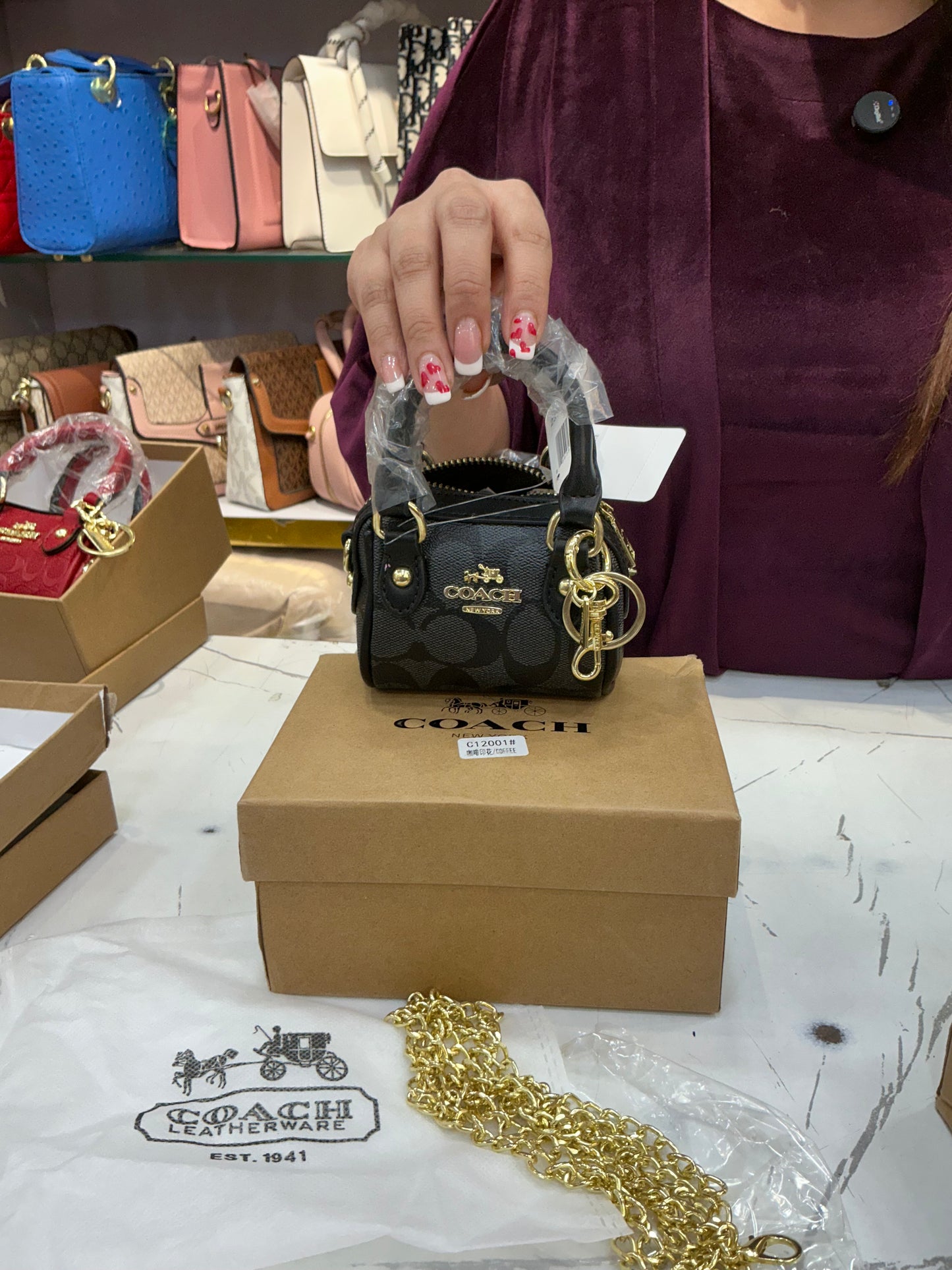 Coach nano sling duffle