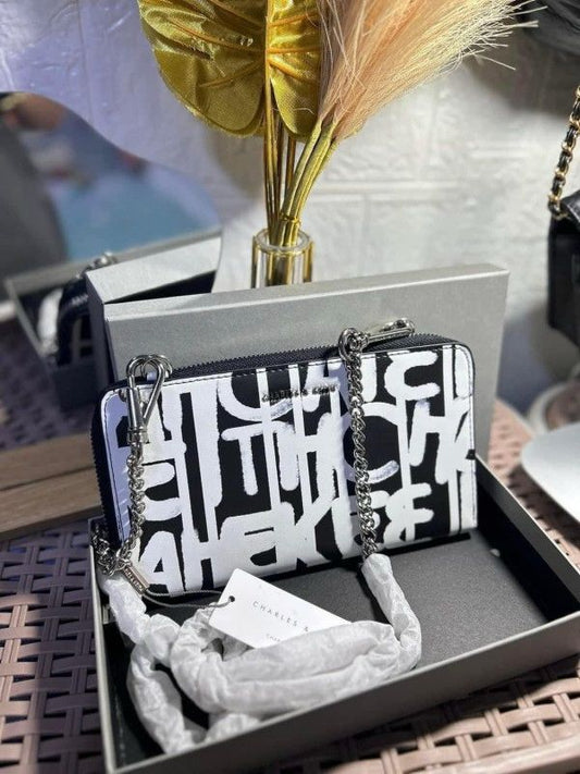 Charles and Keith chain sling