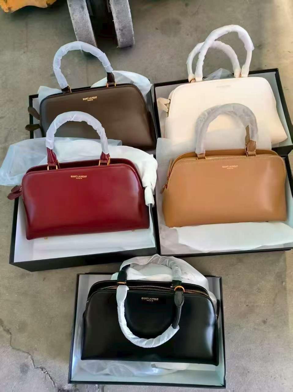 Saint Laurent Sac De Jour Duffel Bags