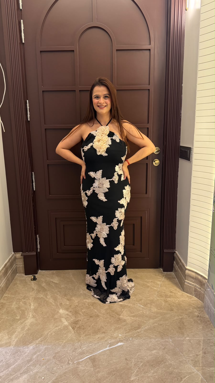 Elegant halter-neck maxi dress featuring cream-colored floral PO170