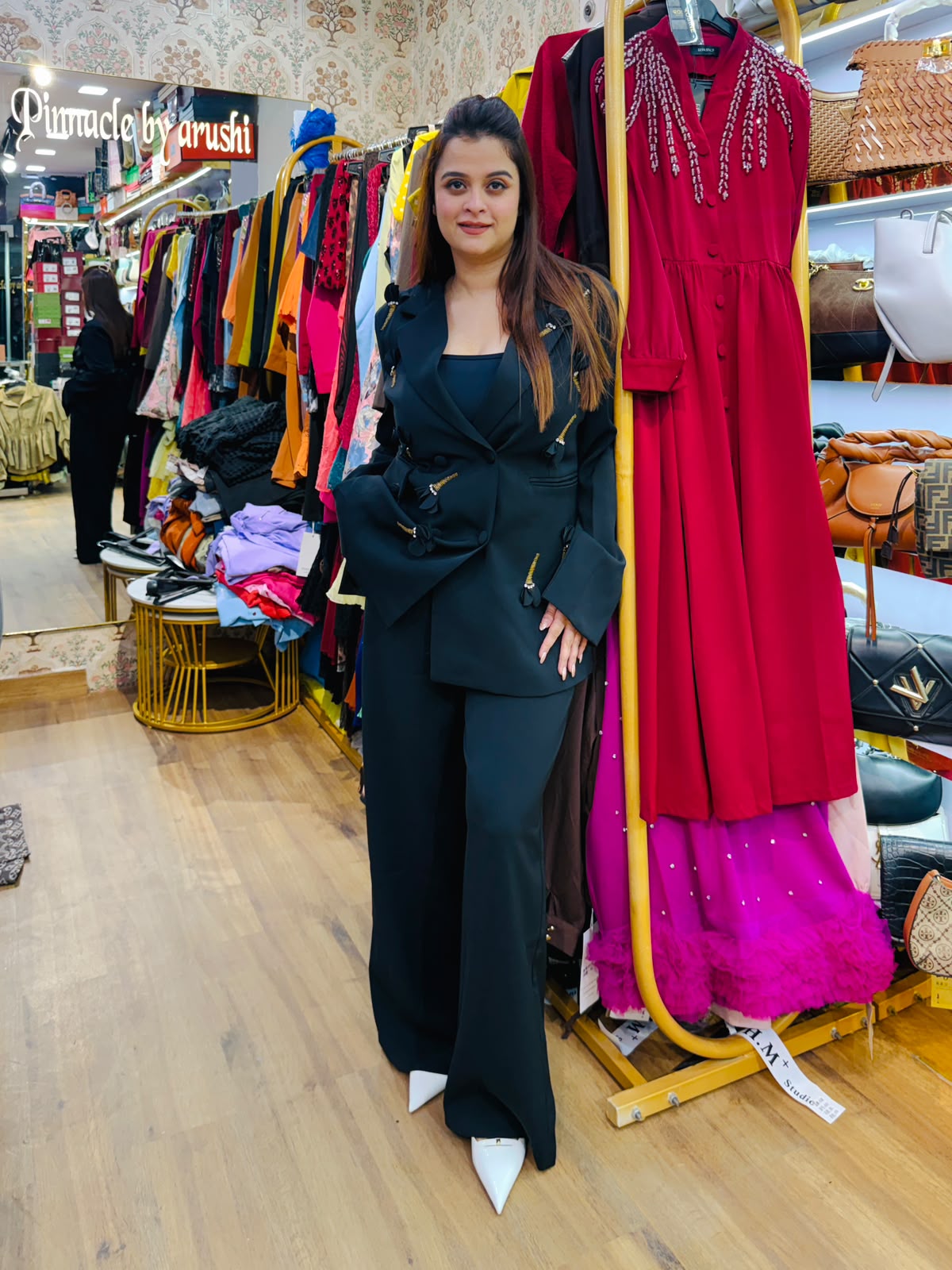 Beautiful black double-breasted blazer embellished with gold-toned charm PO209