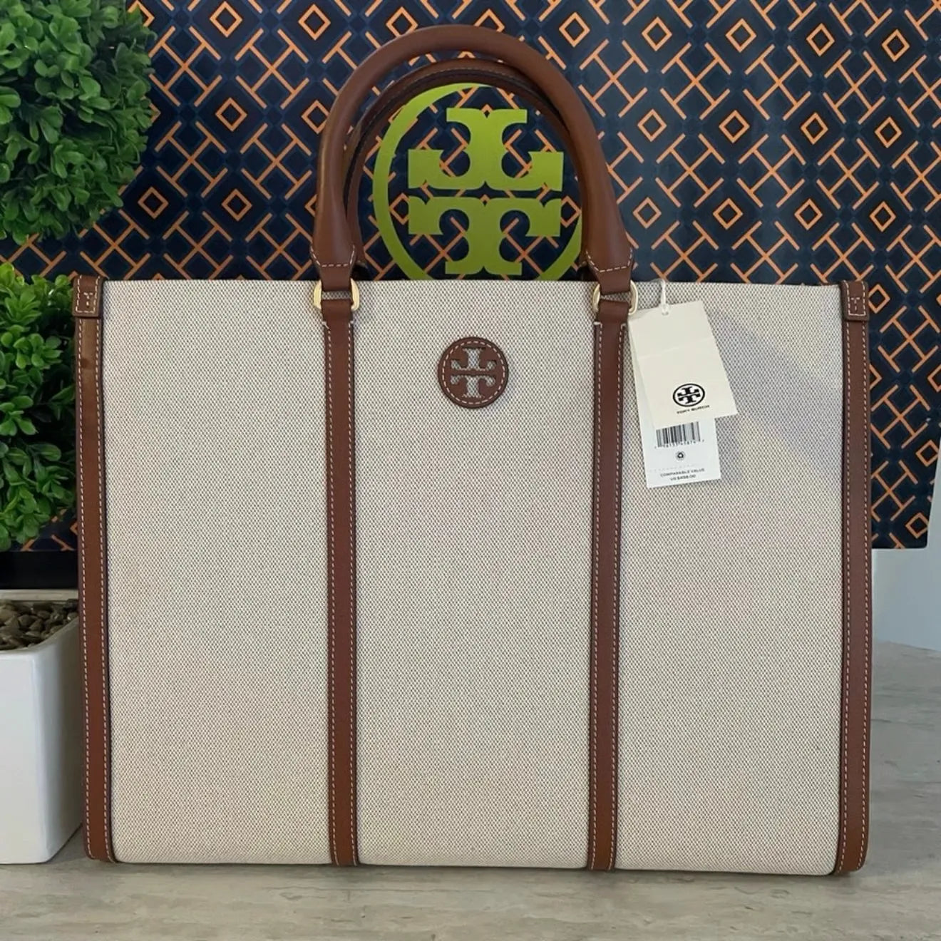 Tory Burch Perry T Monogram Triple-Compartment Tote Bag in various colors.  PO24